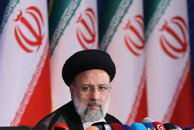 Iran's President-elect Ebrahim Raisi addresses his first press conference in the capital Tehran, on June 21, 2021. - Iran's new president hailed what he called a 'massive' voter turnout during last week's presidential election. The ultraconservative cleric was declared the winner of the election on the weekend, replacing moderate Hassan Rouhani. (Photo by ATTA KENARE / AFP) (Photo by ATTA KENARE/AFP via Getty Images)