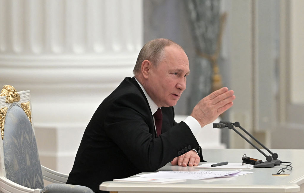 TOPSHOT - Russian President Vladimir Putin chairs a meeting with members of the Security Council in Moscow on February 21, 2022. - President Vladimir Putin said on February 21, 2022, he would make a decision "today" on recognising the independence of east Ukraine's rebel republics, after Russia's top officials made impassioned speeches in favour of the move. (Photo by Alexey NIKOLSKY / Sputnik / AFP) (Photo by ALEXEY NIKOLSKY/Sputnik/AFP via Getty Images)