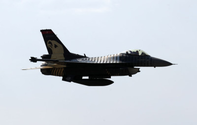 An acrobatic plane pilot performs with General Dynamics F-16 Solo Turk aerial aerobatic aircraft during the 5th Sivrihisar Airshow in Sivrihisar district of Eskisehir, in Turkey, on September 13, 2020. (Photo by Adem ALTAN / AFP) (Photo by ADEM ALTAN/AFP via Getty Images)