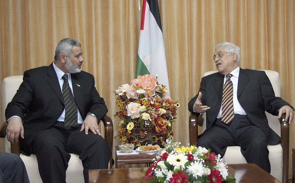 GAZA, GAZA STRIP - APRIL 5:  In this handout photo supplied by the Palestinian Prime Minister's Office, Palestinian Prime Minister Ismail Hanyeh holds talks with Palestinian President, Mahmoud Abbas, in Haniyeh's office on April 5, 2007 in Gaza, Gaza Strip. Haniyeh is due to meet with a UK diplomat today to discuss the kidnapping of BBC journalist Alan Johnston who went missing on March 12, 2007. (Photo by Mohamed Alostaz/PPM via Getty Images)