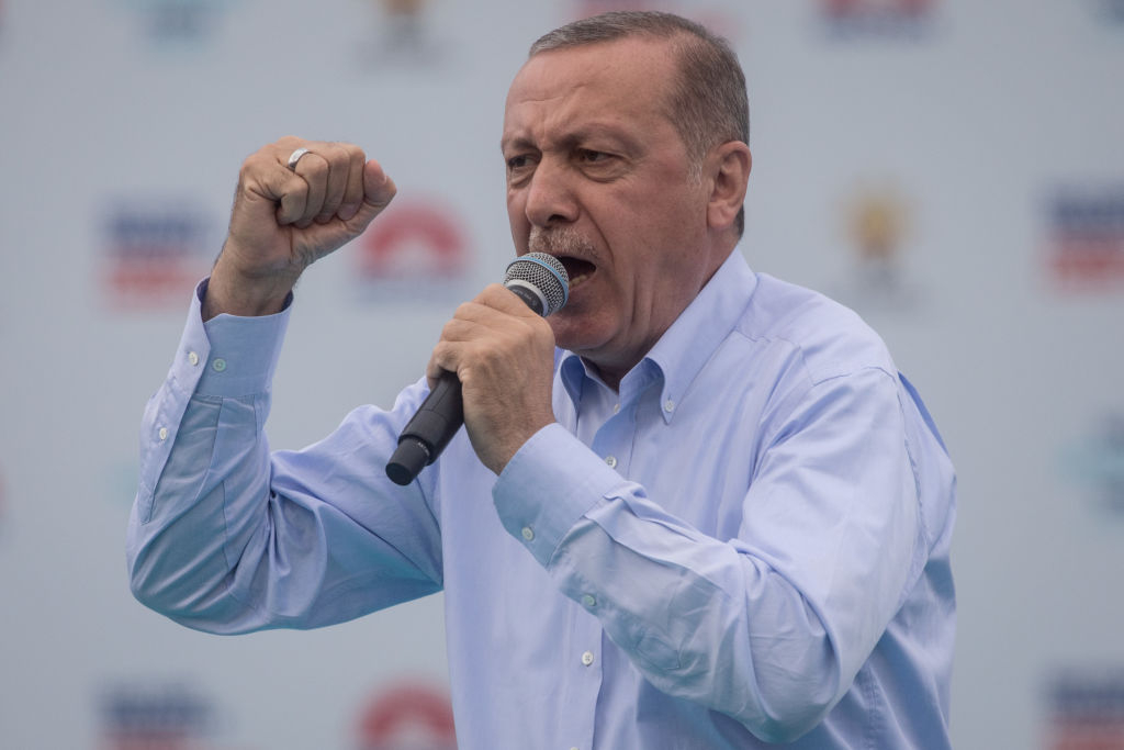 ISTANBUL, TURKEY - JUNE 17:  TurkeyÕs President Recep Tayyip Erdogan speaks to supporters during a AK Parti election rally on June 17, 2018 in Istanbul, Turkey.  Presidential candidates from all parties are holding campaign rallies across Turkey a week ahead of the countries June 24, parliamentary and presidential elections.  (Photo by Chris McGrath/Getty Images)