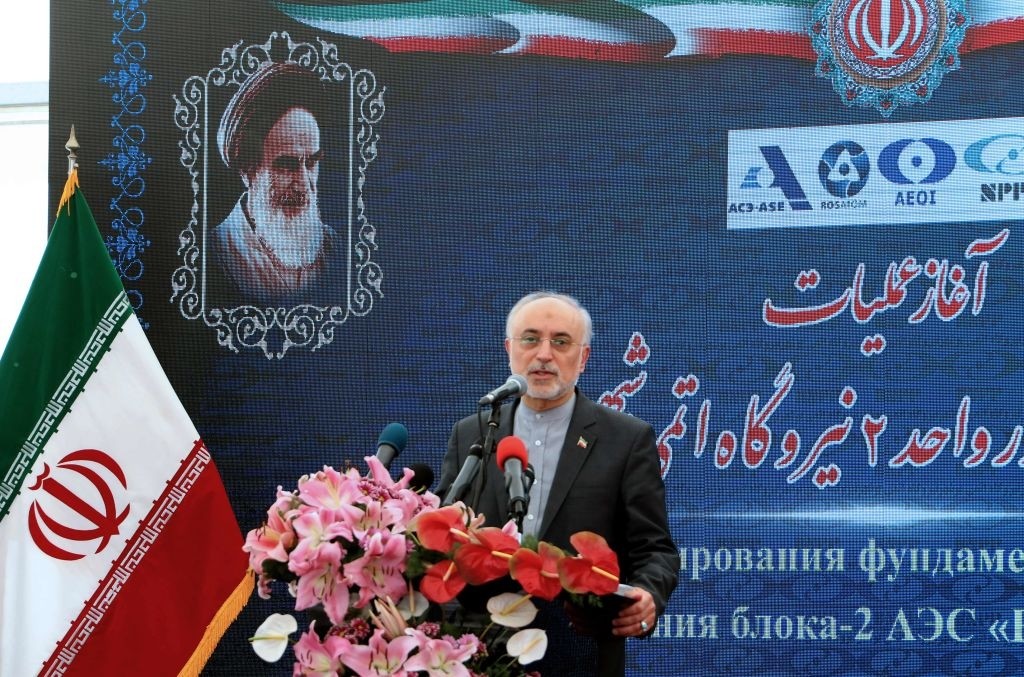 Iran's Atomic Energy Organization head Ali Akbar Salehi delivers a speech at an official ceremony to kick-start works for a second nuclear reactor at Bushehr power plant, on November 10, 2019. Picture in the background shows the late founder of the Islamic republic Ayatollah Ruhollah Khomeini. - Bushehr is Iran's only nuclear power station and is currently running on imported fuel from Russia that is closely monitored by the UN's International Atomic Energy Agency. (Photo by ATTA KENARE / AFP) (Photo by ATTA KENARE/AFP via Getty Images)