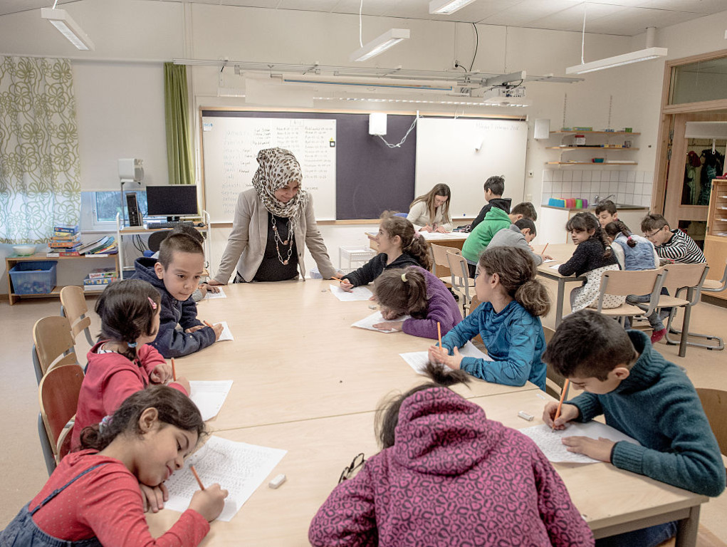 HALMSTAD, SWEDEN - FEBRUARY 08:  Refugee children are seen in a school on February 8, 2016 in Halmstad, Sweden. Last year Sweden received 162,877 asylum applications, more than any European country proportionate to its population. According to the Swedish Migration Agency, Sweden housed more than 180,000 people in 2015, more than double the total in 2014. The country is struggling to house refugees in proper conditions during the harsh winter; summer holiday resorts, old schools and private buildings are being turned into temporary shelters for asylum seekers as they wait for a decision on their asylum application. Sweden is facing new challenges on its migration policy after the massive arrival of refugees last year, forcing the country to drastically reduce the number of refugees passing through its borders. Stricter controls have had a significant effect on the number of arrivals, reducing weekly numbers from 10,000 to 800. The Swedish migration minister announced in January that the government will reject up to 80,000 refugees who applied for asylum last year, proposing strict new residency rules.  (Photo by David Ramos/Getty Images)