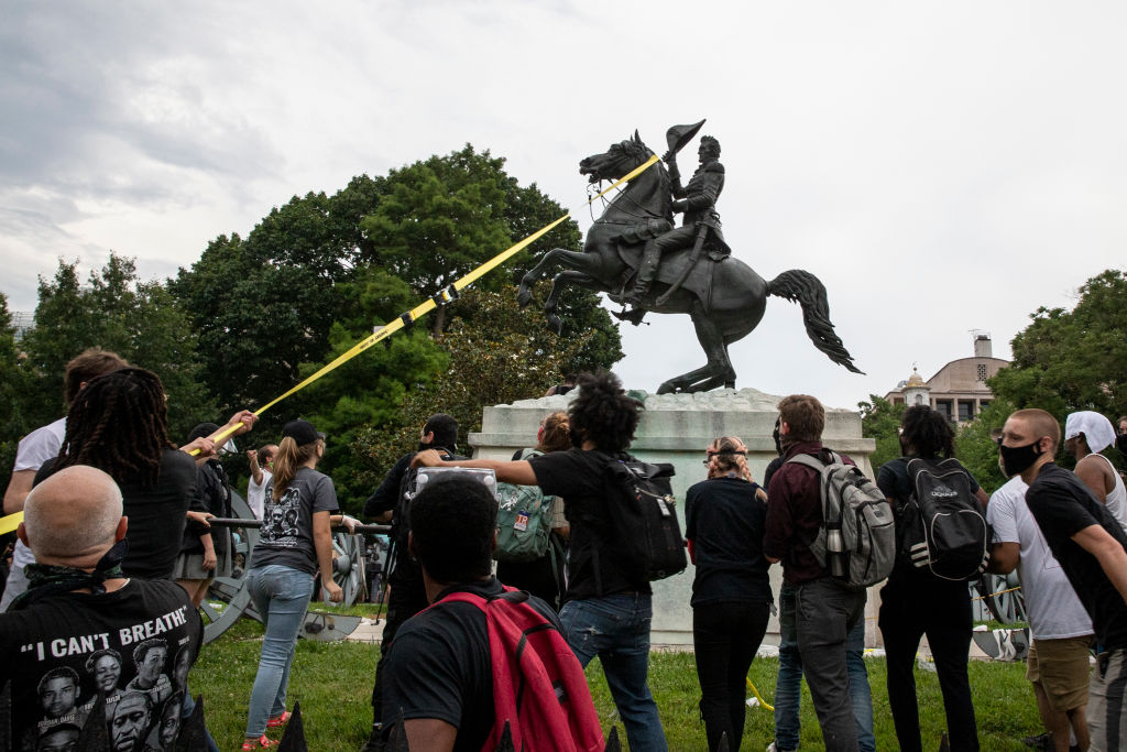 WASHINGTON, DC - JUNE 22:  Protestors attempt to pull down the statue of Andrew Jackson in Lafayette Square near the White House on June 22, 2020 in Washington, DC. Protests continue around the country over the deaths of African Americans while in police custody. (Photo by Tasos Katopodis/Getty Images)